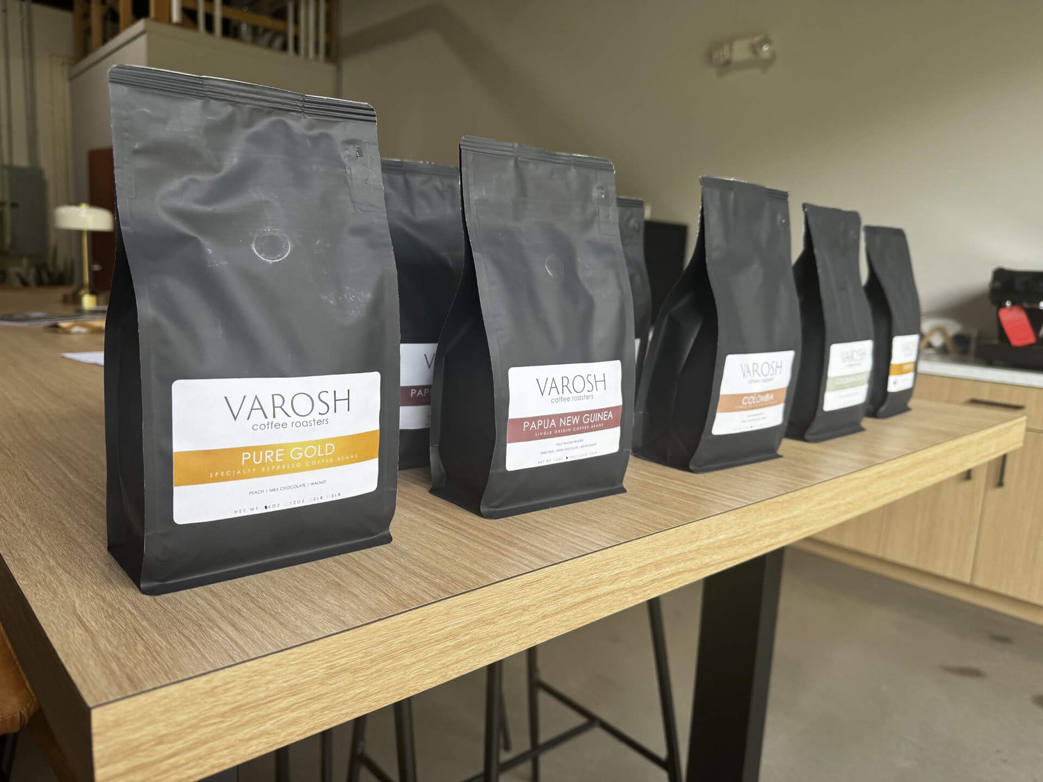 Row of VAROSH specialty coffee beans
